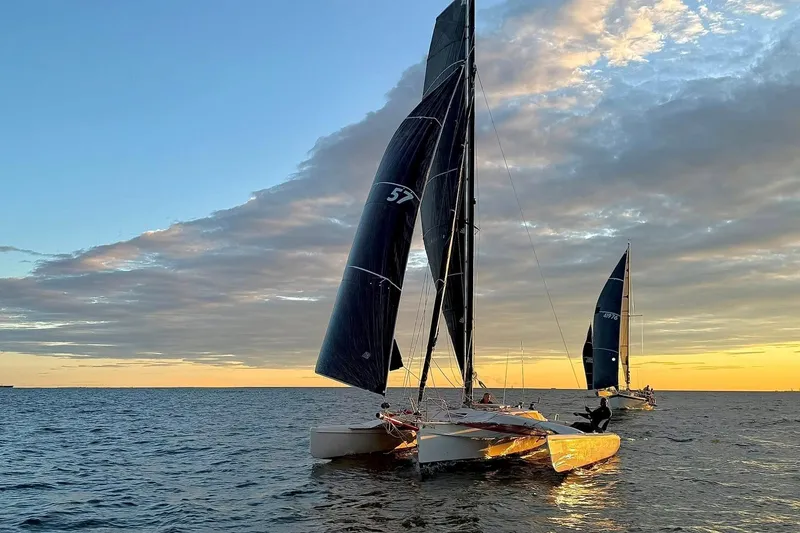 The Image of Sailing at sunset with Corsair F-28R #57, 1998 model, on open water. - 0
