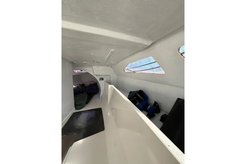 Slide: The Image of Interior of 1998 Corsair F-28R #57 sailboat cabin with sleeping area. - 17