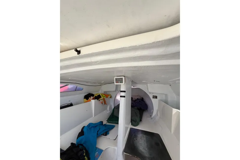 Slide: The Image of Interior of 1998 Corsair F-28R #57 sailboat, showing cabin space and storage. - 18