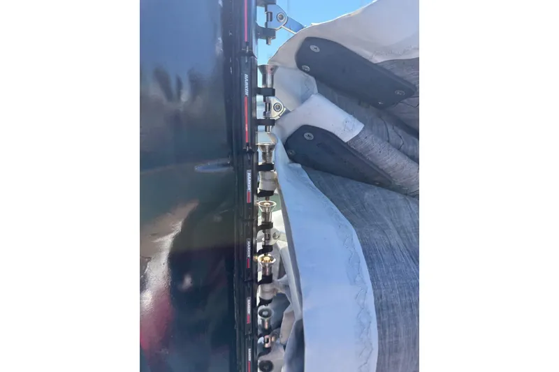 Slide: The Image of Close-up of Corsair F-28R #57 sailboat rigging, 1998 model, showing detailed hardware components. - 21