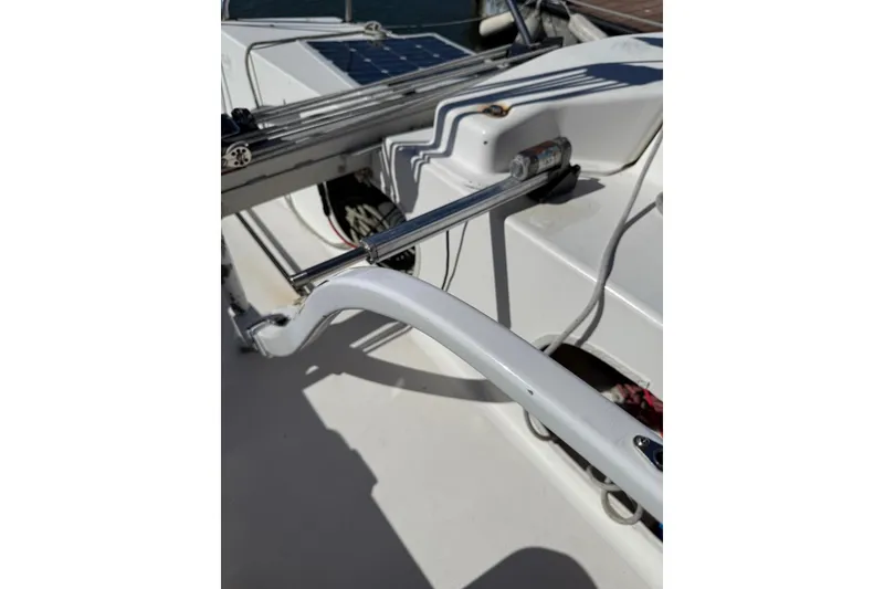 Slide: The Image of Close-up of Corsair F-28R #57 sailboat deck, featuring rigging and hardware, 1998 model. - 22