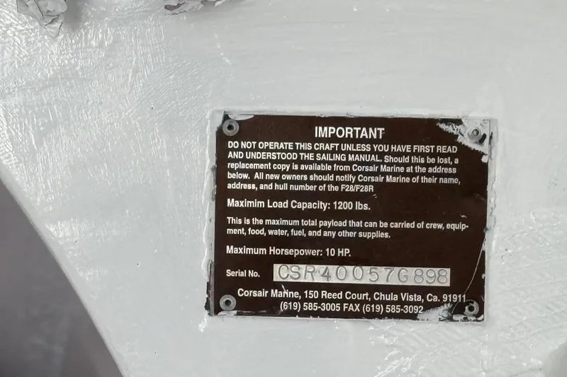 Slide: The Image of Plaque on Corsair F-28R #57, 1998, detailing load capacity and horsepower. - 25