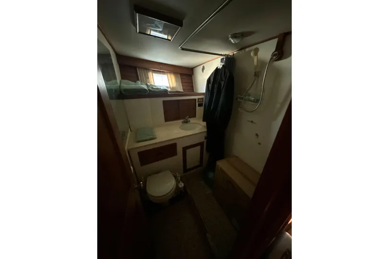 Slide: The Image of 1985 Kong & Halvorsen Island Gypsy yacht bathroom with shower, sink, and toilet. - 13