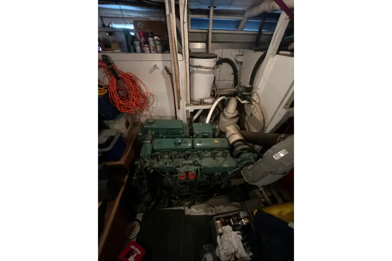 Slide: The Image of Engine room of 1985 Kong & Halvorsen Island Gypsy boat with visible machinery and equipment. - 7