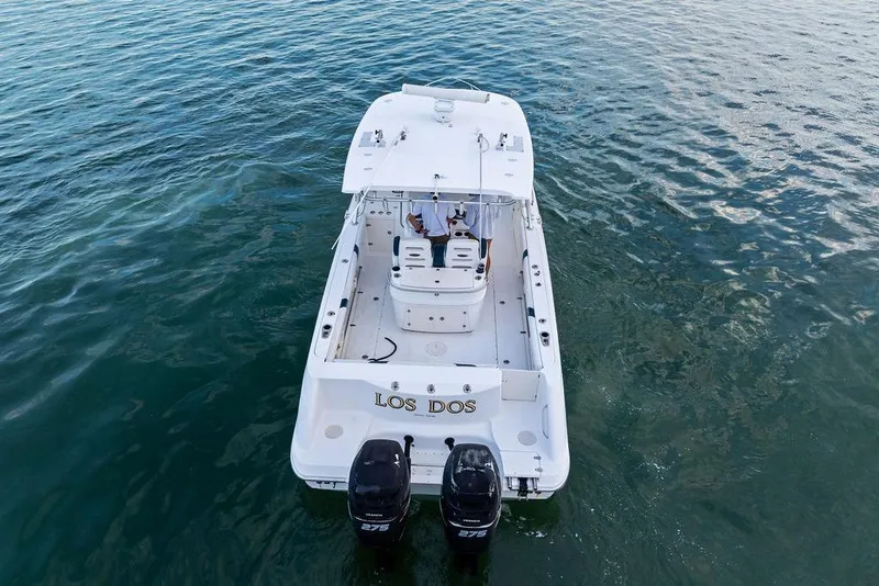 Slide: The Image of 2005 Boston Whaler 320 Outrage Cuddy Cabin on water, aerial view. - 9
