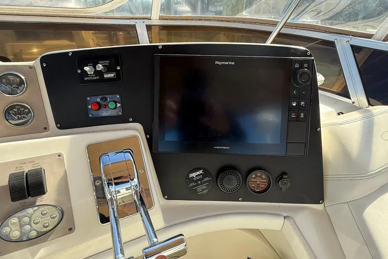 Slide: The Image of Control panel of a 2003 Regal Commodore 3880 boat with navigation equipment. - 15