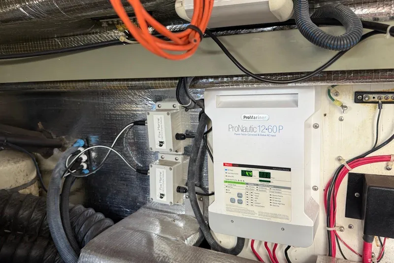 Slide: The Image of Electrical system of a 2003 Regal Commodore 3880 boat, featuring ProMariner ProNautic charger. - 51