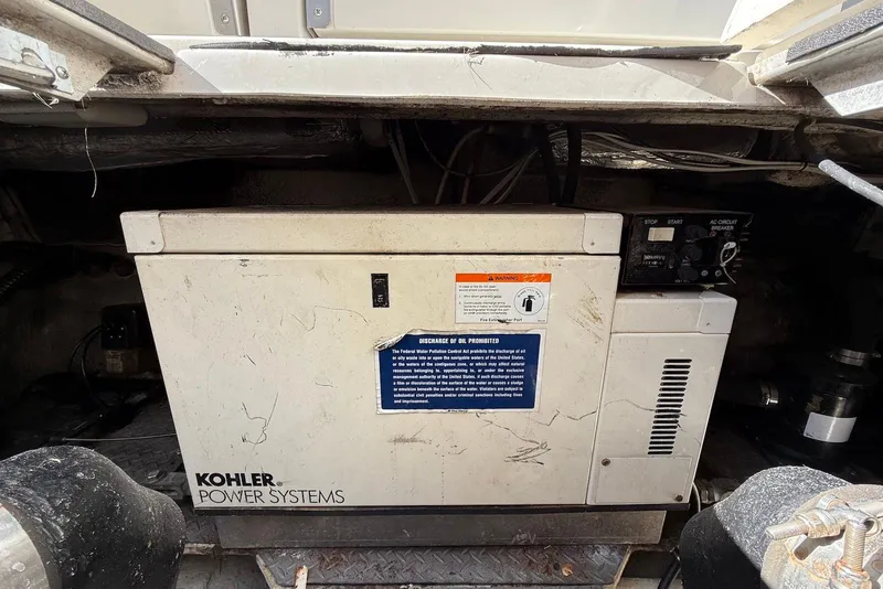 Slide: The Image of Kohler power system in 2003 Regal Commodore 3880 boat engine compartment. - 53
