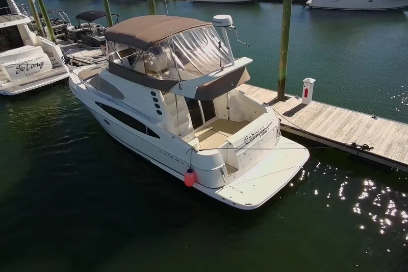 Slide: The Image of 2003 Regal Commodore 3880 yacht docked at marina, aerial view. - 9