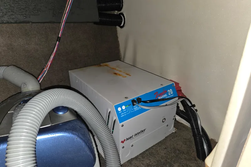 Slide: The Image of Marine battery charger in a 1990 Trojan 10 Meter Express 330 boat interior. - 37