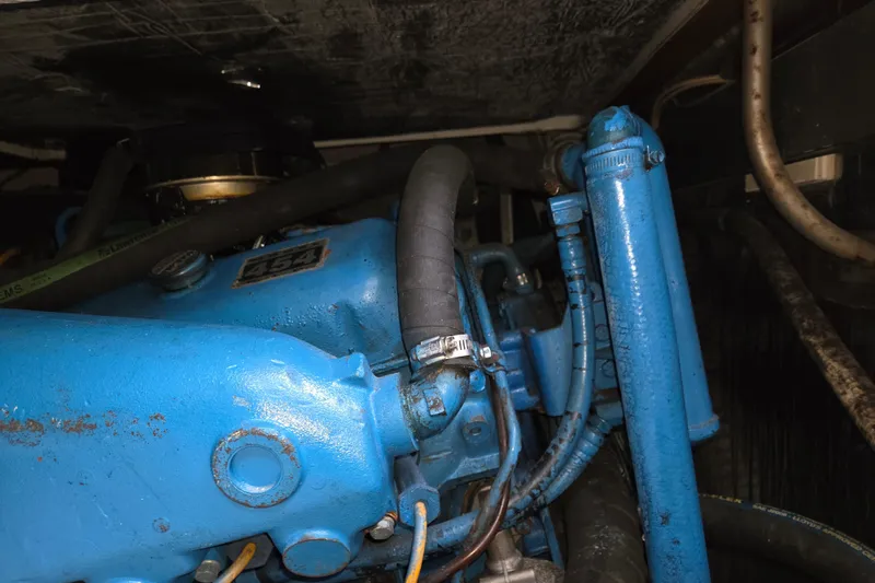 Slide: The Image of Engine compartment of a 1990 Trojan 10 Meter Express 330 boat. - 42