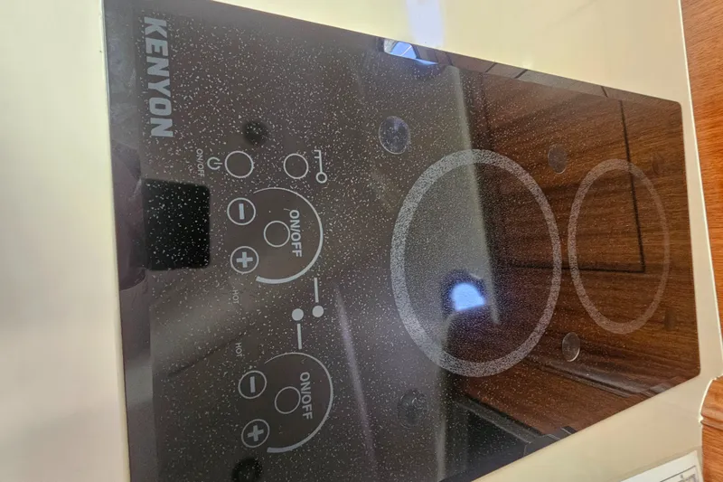 Slide: The Image of Kenyon electric cooktop on 2016 Pursuit OS 385 Offshore yacht. - 22