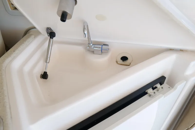 Slide: The Image of Mini fridge stocked with beverages on a 2008 Tiara Yachts 4300 Sovran. - 21