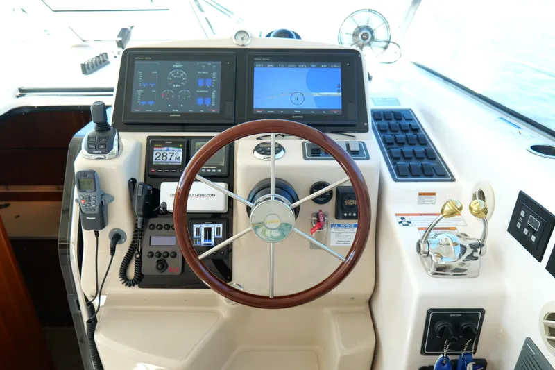 Slide: The Image of 2008 Tiara Yachts 4300 Sovran helm with advanced navigation and control systems. - 24