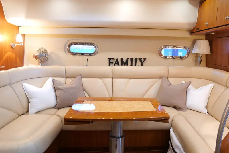 Slide: The Image of Luxurious interior of 2008 Tiara Yachts 4300 Sovran with wood finishes and cozy seating. - 30