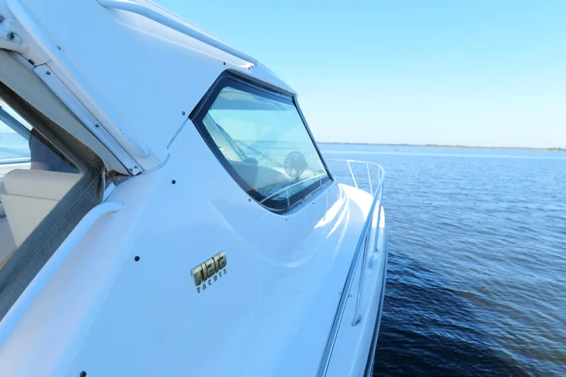 Slide: The Image of Compact bathroom in 2008 Tiara Yachts 4300 Sovran, featuring toilet and storage hooks. - 47