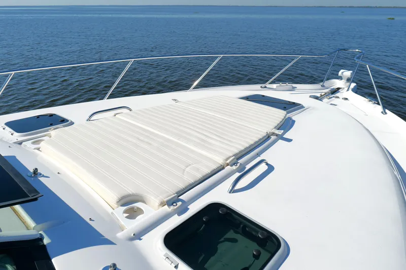 Slide: The Image of 2008 Tiara Yachts 4300 Sovran cruising on calm blue waters. - 48