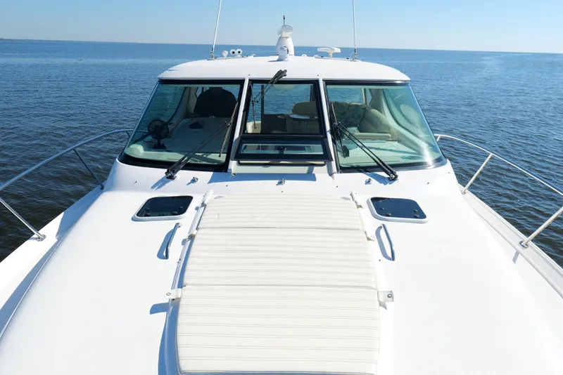 Slide: The Image of 2008 Tiara Yachts 4300 Sovran deck with cushioned sunpad, ocean view. - 50
