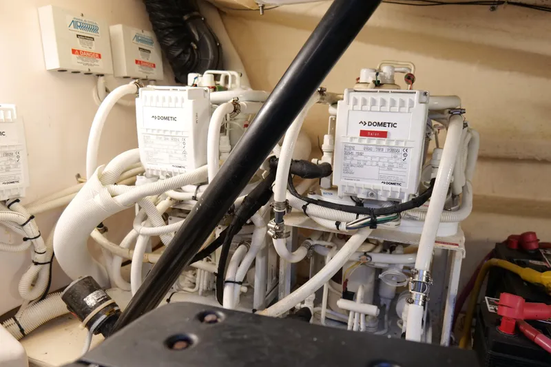 Slide: The Image of Engine room of 2008 Tiara Yachts 4300 Sovran with Dometic systems and wiring. - 58