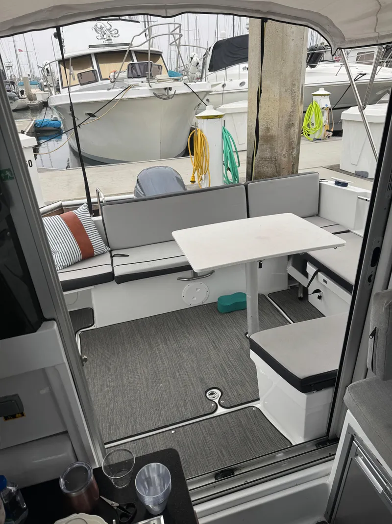 Slide: The Image of Battery setup in a 2020 Jeanneau NC 795 boat with connected cables. - 18