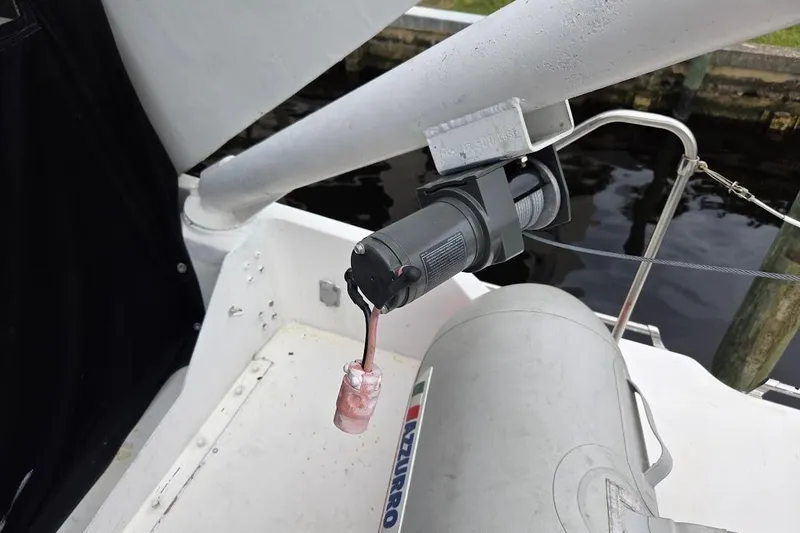 Slide: The Image of 1987 Bayliner 4550 Motoryacht deck with winch and inflatable boat. - 67