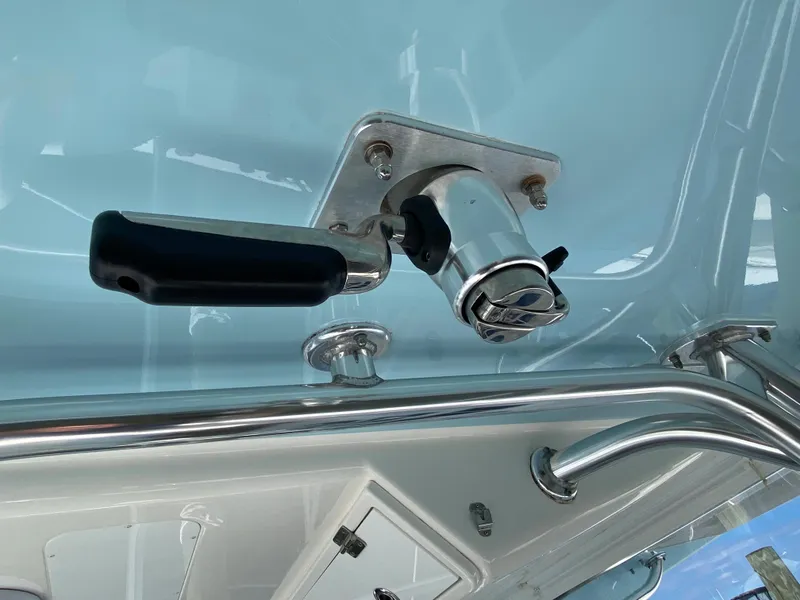Slide: The Image of Close-up of a 2016 Regulator 41 boat's steering mechanism and handle. - 42