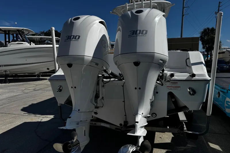 Slide: The Image of 2018 Sportsman Open 282TE Center Console with twin 300 horsepower engines. - 2