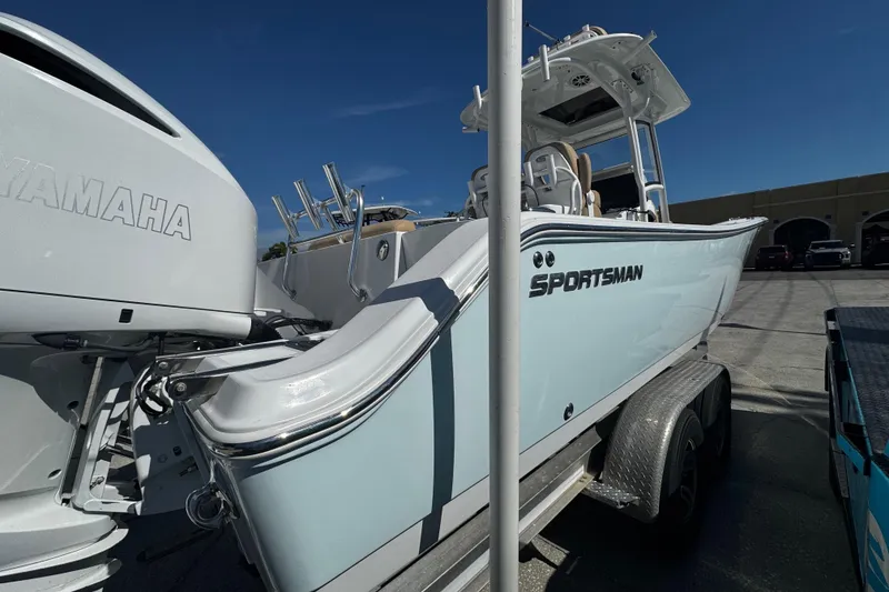 Slide: The Image of 2018 Sportsman Open 282TE Center Console boat on trailer, featuring Yamaha engine. - 3