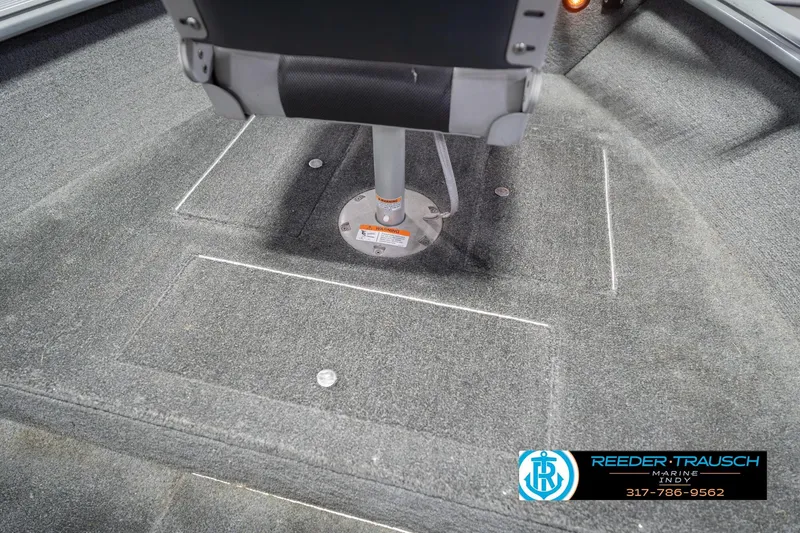 Slide: The Image of 2007 Lund 1600 Explorer SS boat interior with carpeted flooring and seat base. - 26