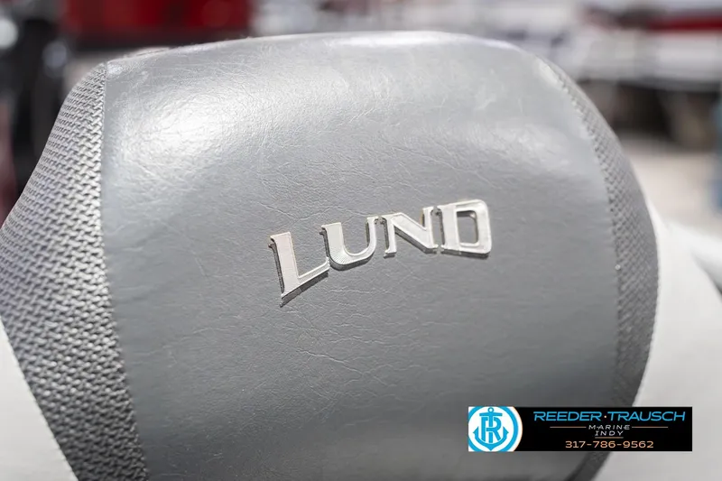 Slide: The Image of Gray Lund boat seat with logo, 2007 Lund 1600 Explorer SS. Reeder-Trausch Marine contact info visible. - 32