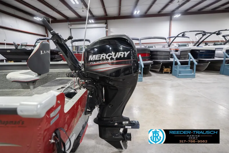 Slide: The Image of 2007 Lund 1600 Explorer SS with Mercury FourStroke engine in a showroom. - 37