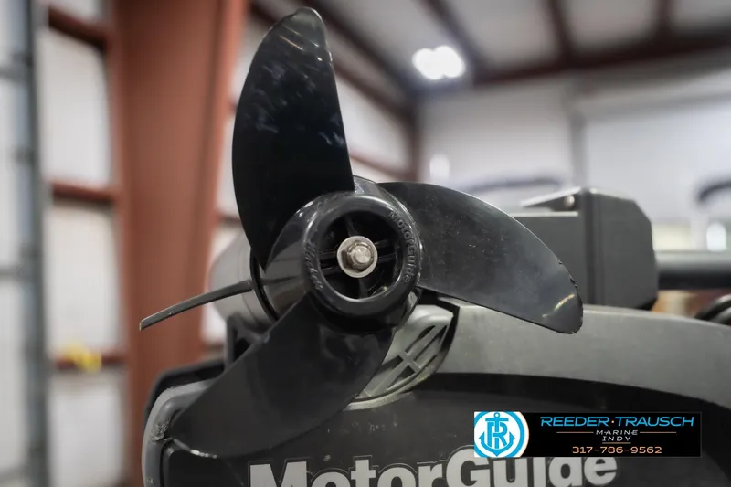Slide: The Image of Close-up of a MotorGuide propeller on a 2007 Lund 1600 Explorer SS boat. - 44