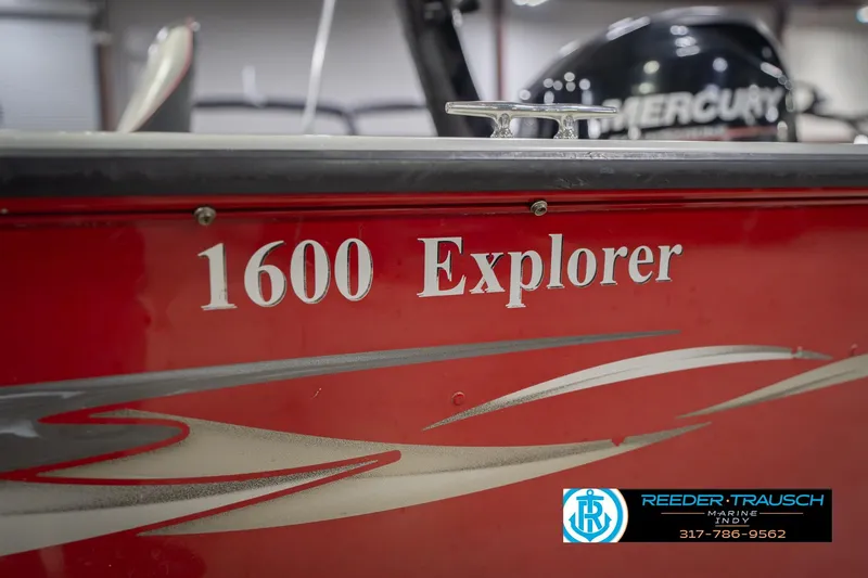 Slide: The Image of Red 2007 Lund 1600 Explorer SS boat with Mercury engine, Reeder-Trausch Marine logo visible. - 46