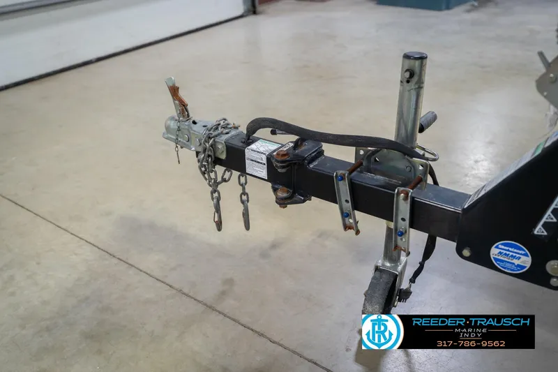 Slide: The Image of Trailer hitch of a 2007 Lund 1600 Explorer SS in a garage setting. - 47