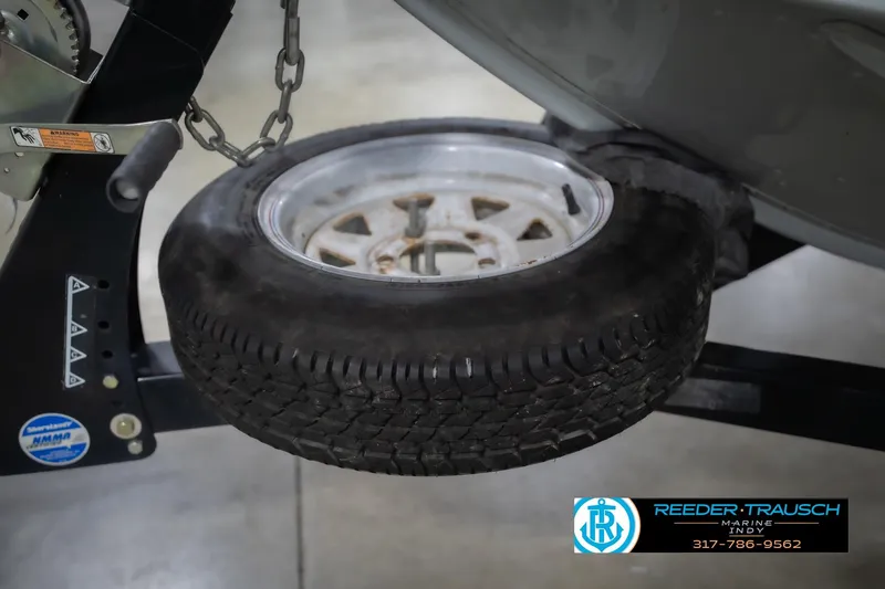 Slide: The Image of Spare tire mounted on a 2007 Lund 1600 Explorer SS boat trailer. - 49