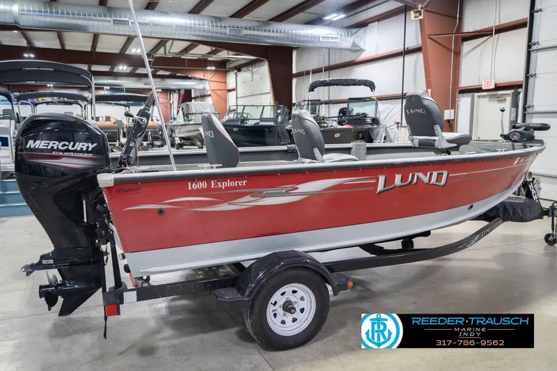 Slide: The Image of 2007 Lund 1600 Explorer SS boat with Mercury engine in showroom. - 7