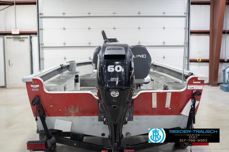 Slide: The Image of 2007 Lund 1600 Explorer SS boat with Mercury 60 engine in a garage. - 8