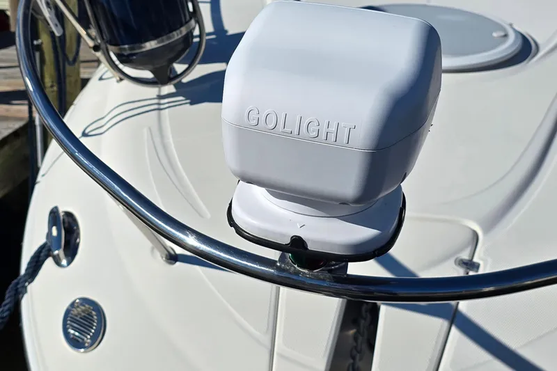 Slide: The Image of 2007 Monterey 250 Cruiser boat with Golight spotlight on deck. - 12