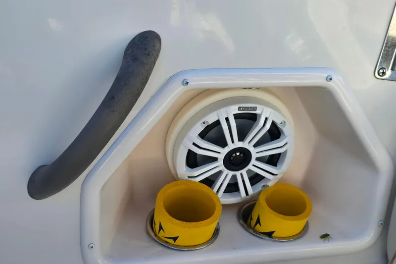 Slide: The Image of 2007 Monterey 250 Cruiser speaker and cup holders on boat deck. - 25