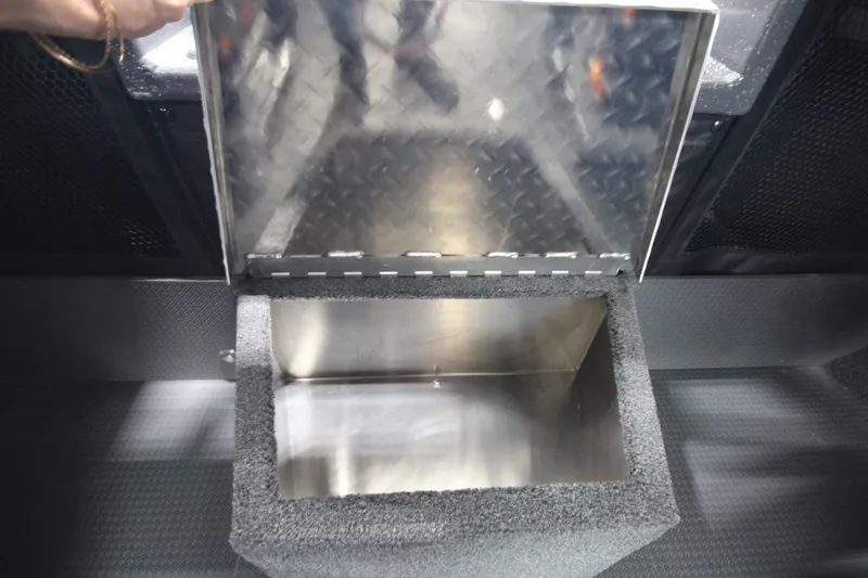 Slide: The Image of Open storage compartment in 2026 Weldcraft 240 Ocean King F300XCB boat. - 31