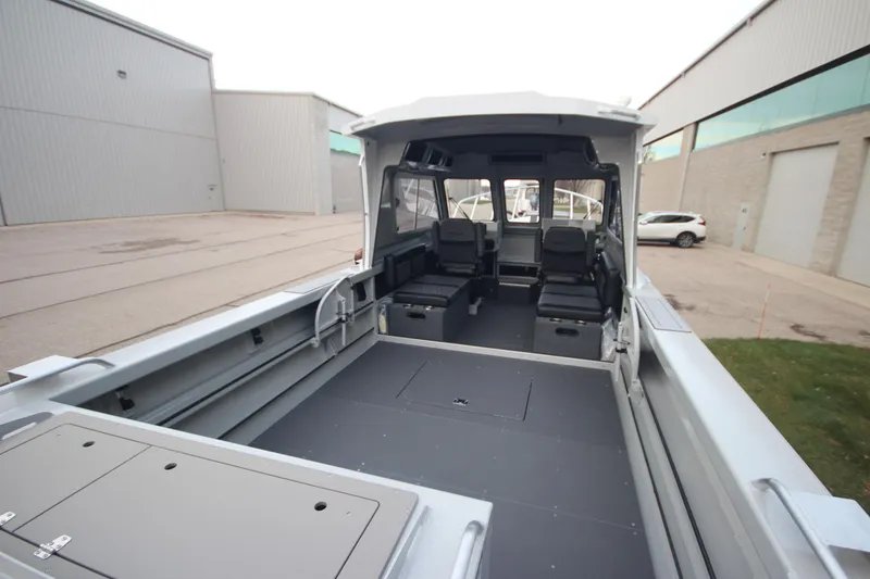 Slide: The Image of 2026 Weldcraft 240 Ocean King boat with Yamaha outboard engines in showroom. - 5