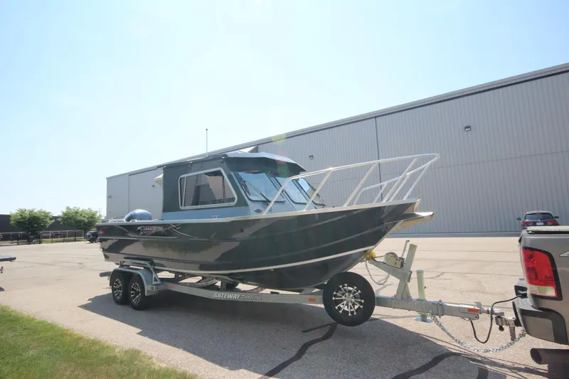 Slide: The Image of 2026 Weldcraft 240 Ocean King F300XCB boat displayed in showroom. - 1