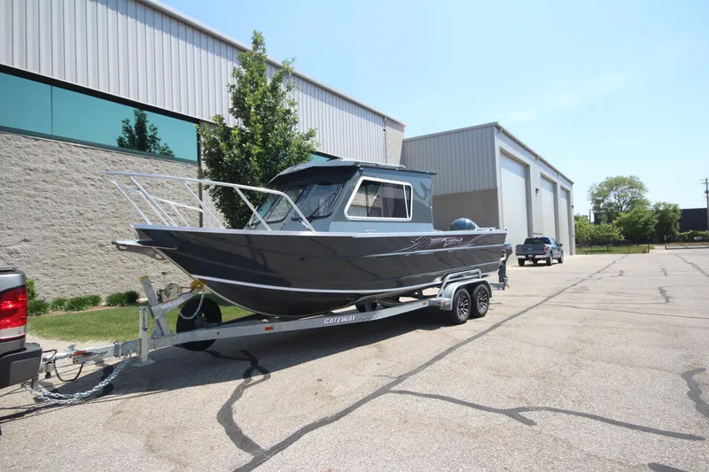 Slide: The Image of 2026 Weldcraft 240 Ocean King F300XCB boat displayed indoors. - 3