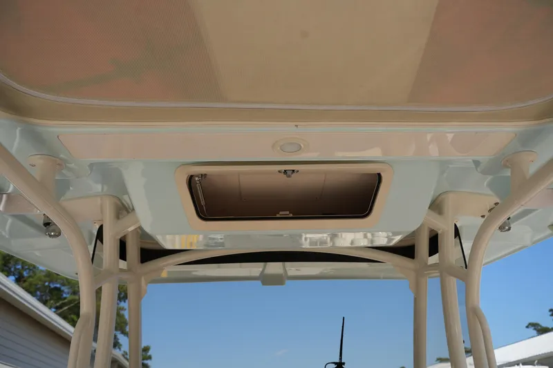 Slide: The Image of 2021 Grady-White Canyon 326 boat roof with storage compartment. - 26
