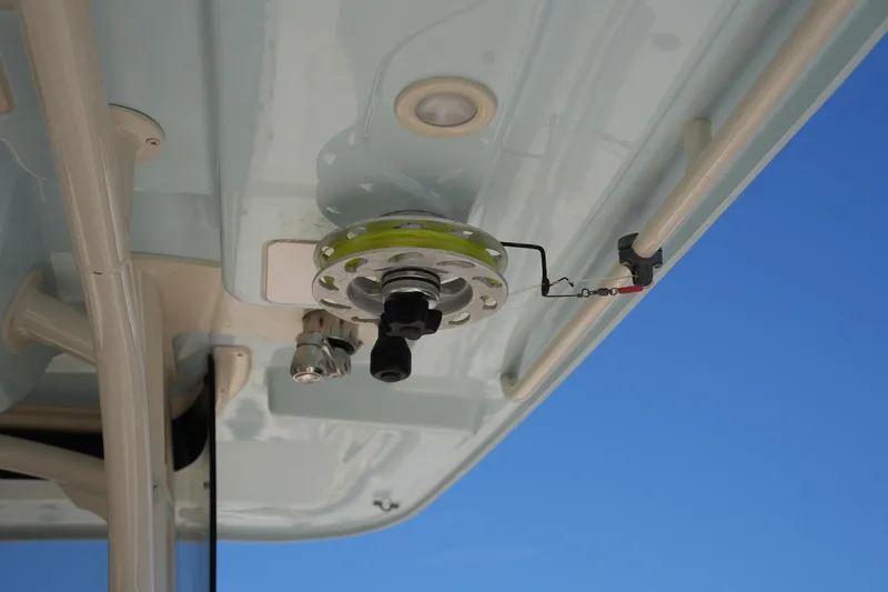 Slide: The Image of 2021 Grady-White Canyon 326 boat detail against clear blue sky. - 28