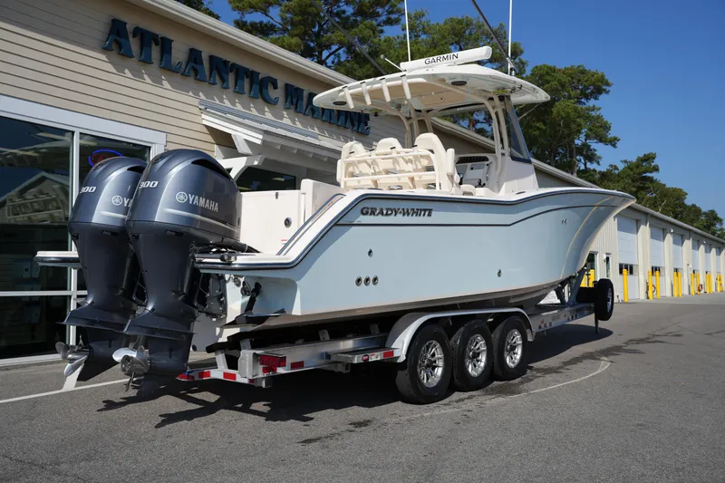 Slide: The Image of 2021 Grady-White Canyon 326 boat with Yamaha engines on a trailer. - 5