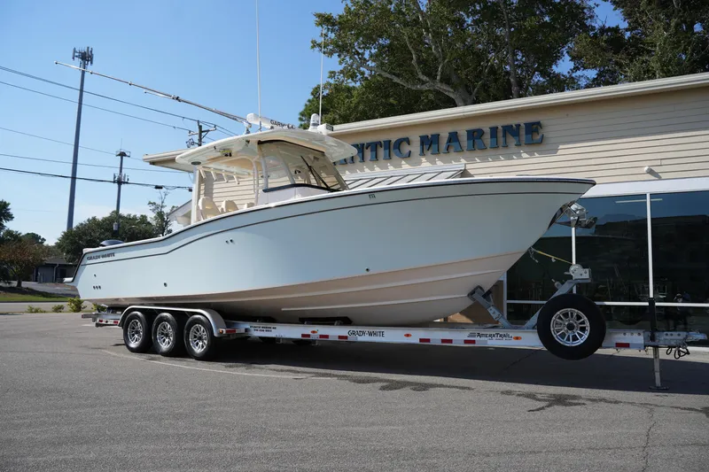 Slide: The Image of 2021 Grady-White Canyon 326 boat on trailer outside Atlantic Marine dealership. - 7