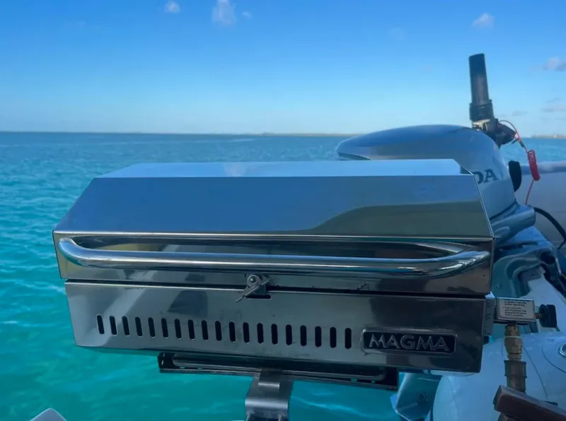 Slide: The Image of Stainless steel Magma grill on a 2018 Leopard 40 catamaran, ocean backdrop. - 13