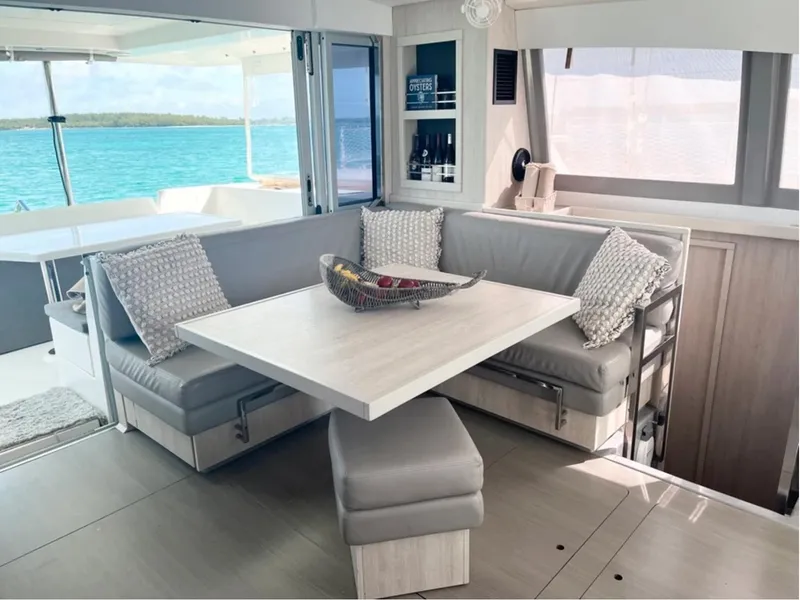 Slide: The Image of Luxurious interior of 2018 Leopard 40 catamaran with elegant seating and ocean view. - 2