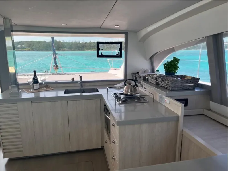 Slide: The Image of Modern kitchen interior on a 2018 Leopard 40 catamaran with ocean view. - 8